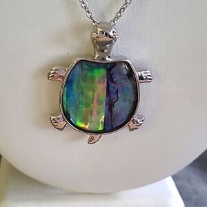 New abalone shell turtle pendant on silvertone chain